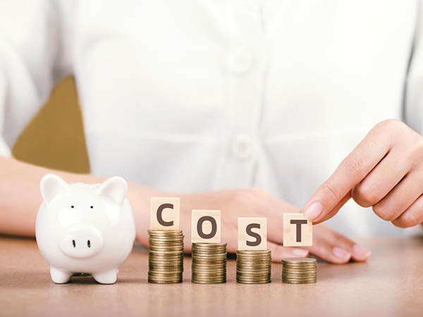 women holding word SAVE on step stacked coins. concept saving mo